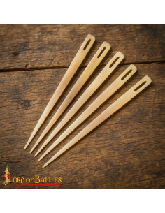 Set of 5 hand-carved bone needles (9 cm.)