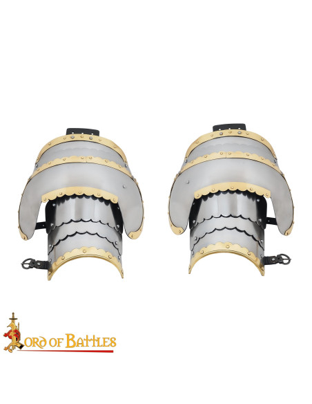 Medieval steel pauldrons with brass...