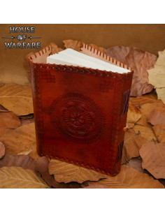 Medieval diary with leather cover, floral design, and...
