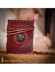 Medieval diary with leather cover and embedded stone