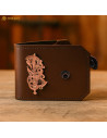 Leather wallet with cast bronze decoration