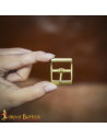Small medieval buckle in solid brass (3.3x2.6 cm.)