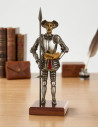 Don Quixote miniature with spear and book, 24 cms.