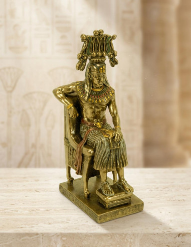 Figure Egyptian pharaoh on his throne