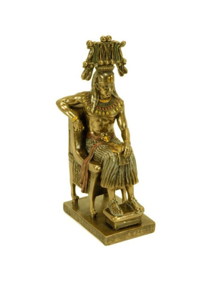 Figure Egyptian pharaoh on his throne