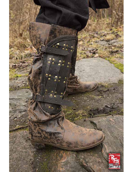 Medieval soldier leather greaves
