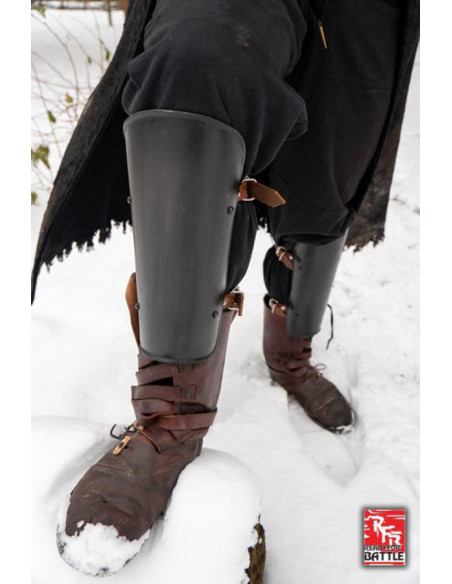 Simple medieval greaves in black,...
