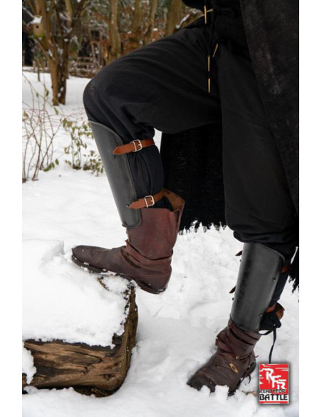 Simple medieval greaves in black,...