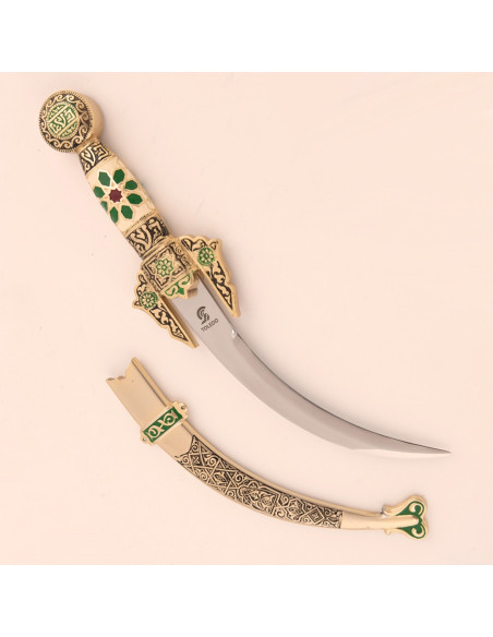 Curved Arab dagger decorated with...