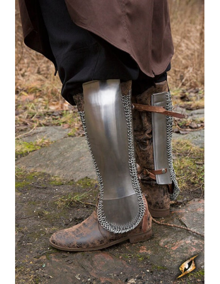 Persian greaves in polished steel