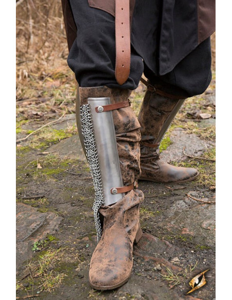 Persian greaves in polished steel