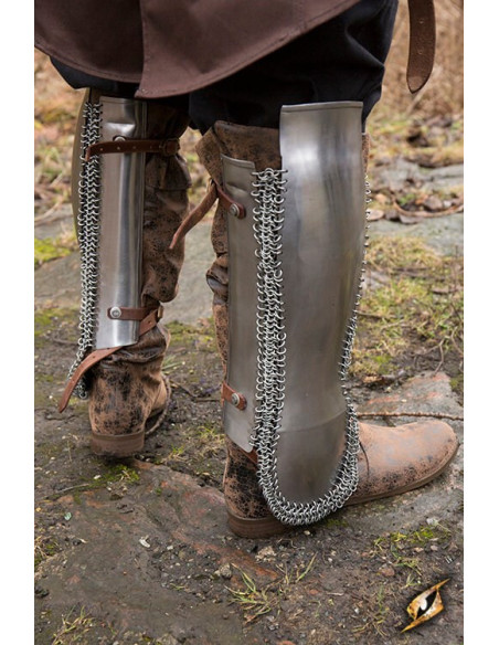 Persian greaves in polished steel