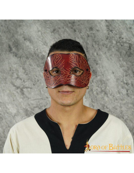 Red leather mask with embossed maple...