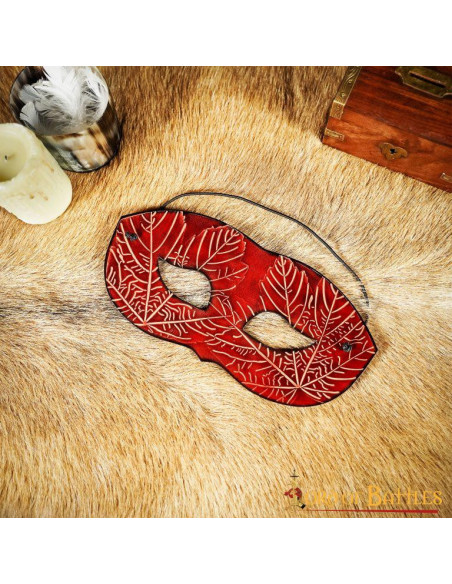 Red leather mask with embossed maple...