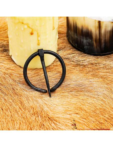Medieval cape fibula in wrought iron