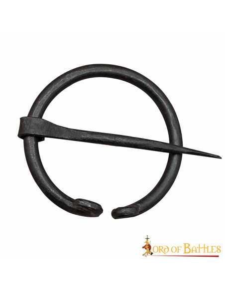 Medieval cape fibula in wrought iron