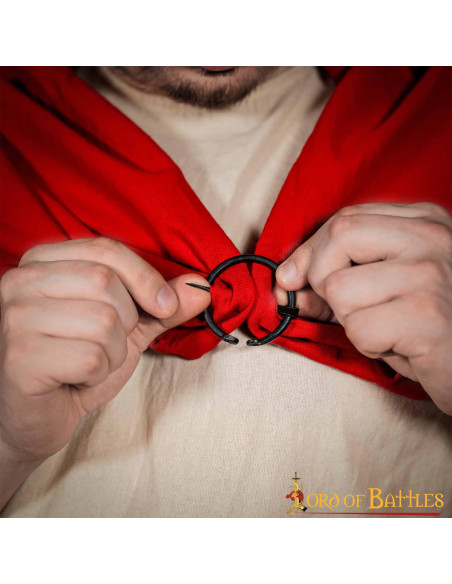 Medieval cape fibula in wrought iron