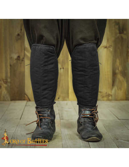 Padded medieval greaves, black color