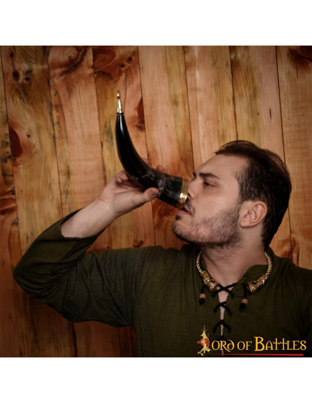 Viking horned stallion on ox horn