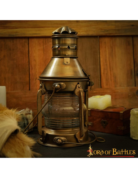 Medieval brass oil lamp (15.7x33 cm.)