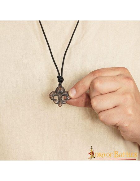Medieval pendant fleur de lis in aged...