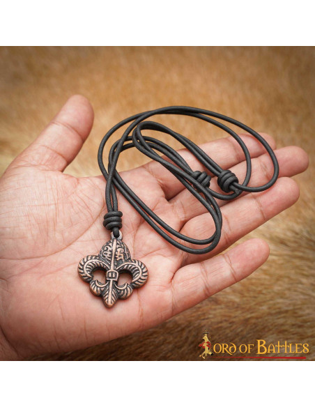 Medieval pendant fleur de lis in aged...