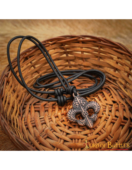 Medieval pendant fleur de lis in aged...