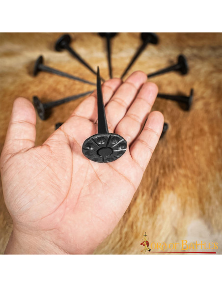 Medieval nail, round head, forged by...