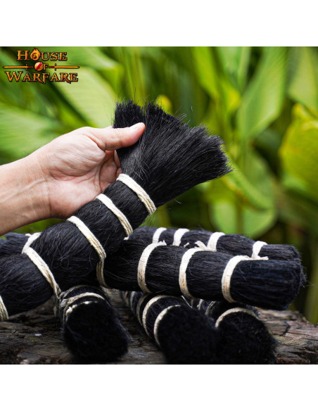 Replacement tuft of dark natural hair...