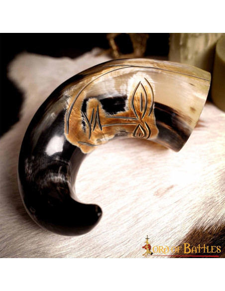 Medieval tribal face horn to drink...