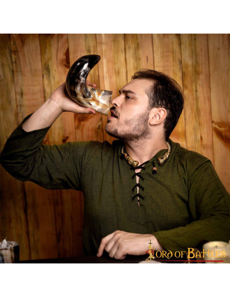 Medieval tribal face horn to drink...