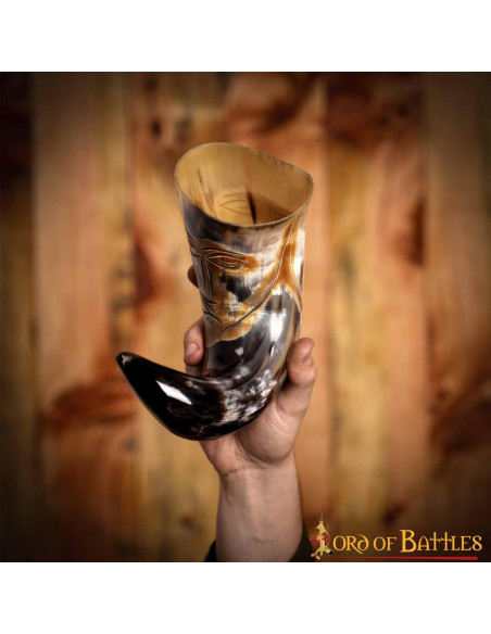 Medieval tribal face horn to drink...