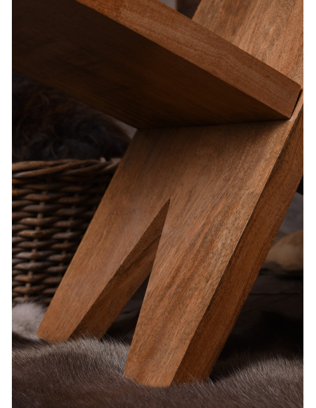 Medieval wooden chair in the shape of...