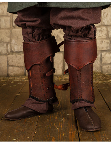 Medieval brown leather greaves...