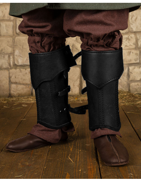 Medieval black leather greaves...