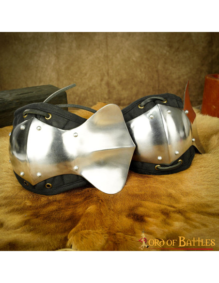 Padded steel elbow braces for...