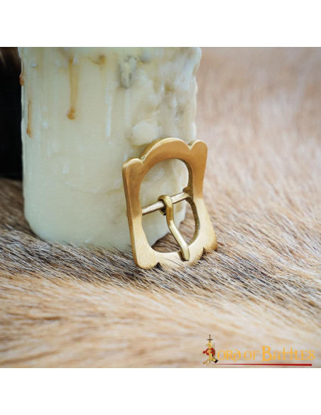 Set of 5 late middle age brass buckles