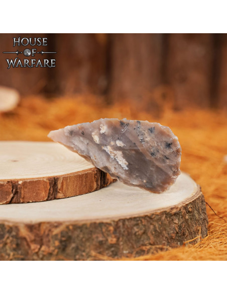 Dark brown flint arrowhead (7.6 cm.)