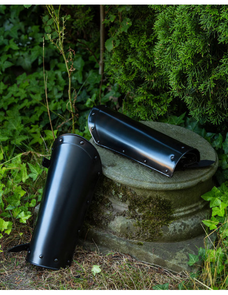 Medieval Balthasar greaves, blackened...