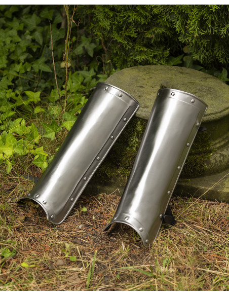 Medieval Jost greaves in polished steel