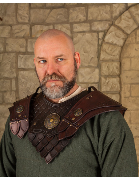 Brown leather shoulder pads embossed...