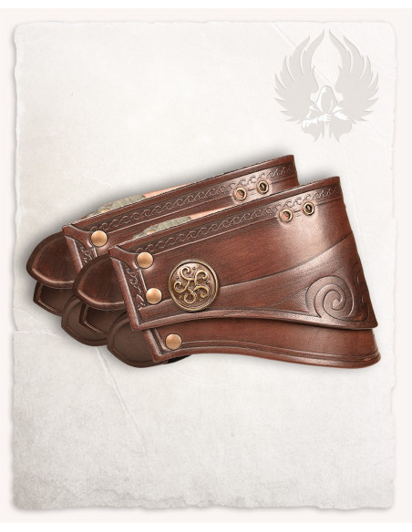 Brown leather shoulder pads embossed...