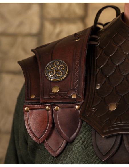 Brown leather shoulder pads embossed...