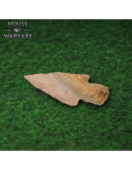 Small flint stone arrowhead (6 cm.)
