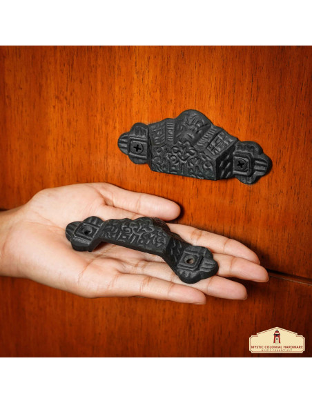 Set of 4 medieval drawer handles...