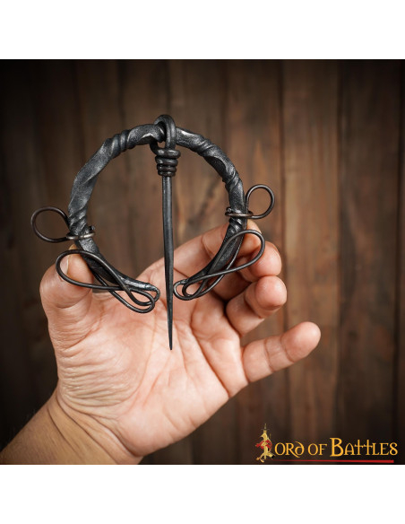 Celtic fibula in wrought iron with knots Celtic fibula in wrought iron with knots