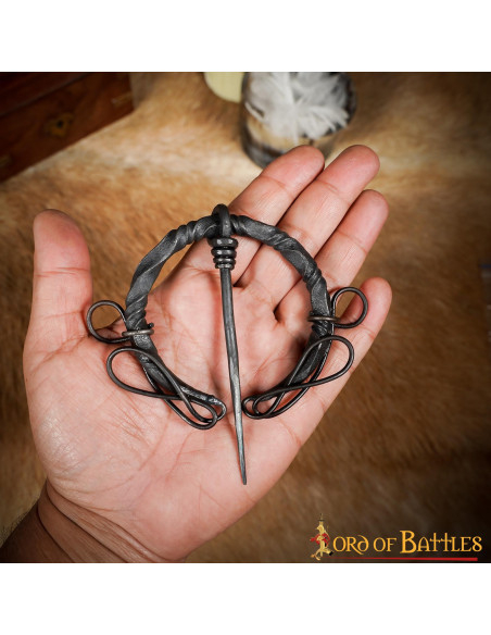 Celtic fibula in wrought iron with knots Celtic fibula in wrought iron with knots