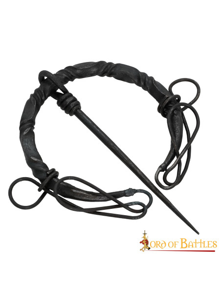 Celtic fibula in wrought iron with knots Celtic fibula in wrought iron with knots