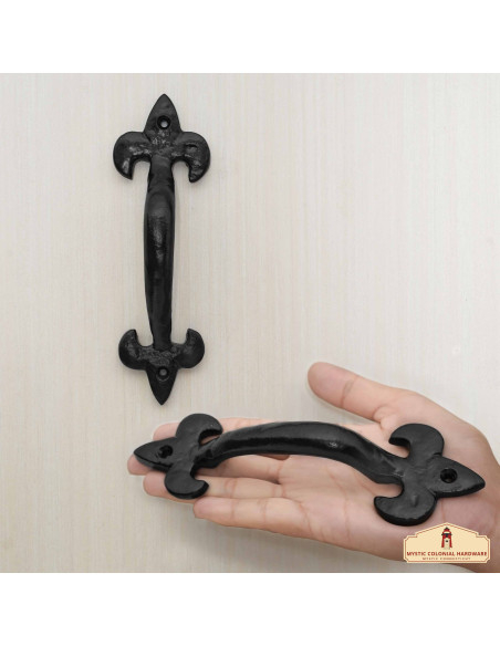 Medieval fleur-de-lis door handle...