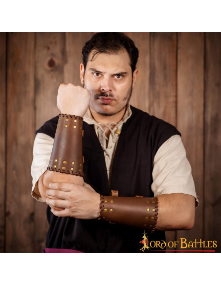 Medieval brown leather bracers with...
